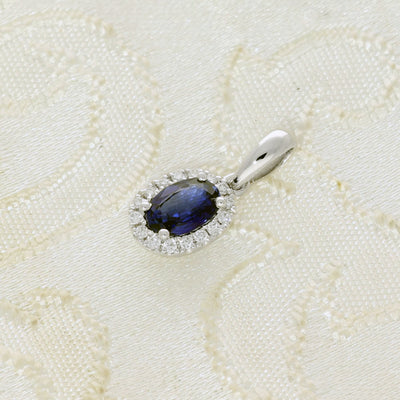 18ct White Gold Oval Sapphire & Diamond Halo Pendant