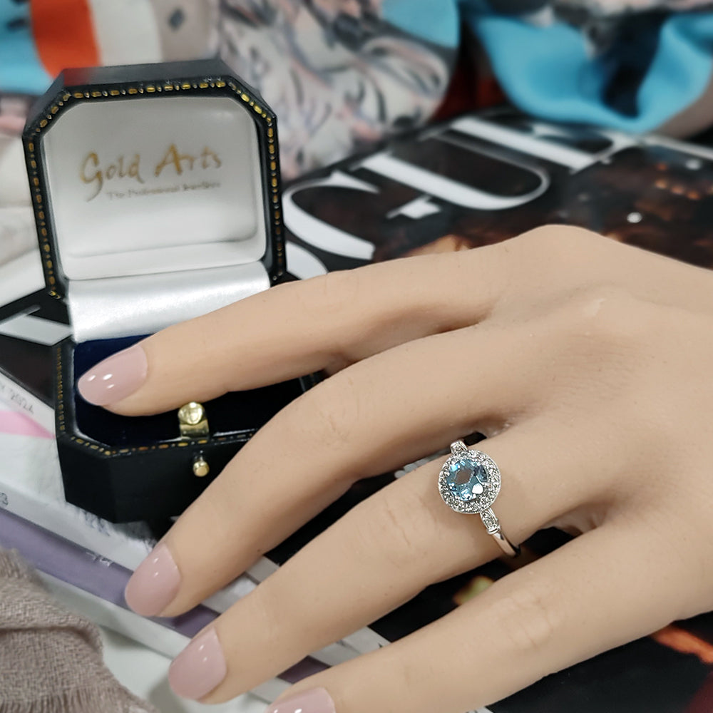 18ct White Gold Aquamarine & Diamond Halo Ring