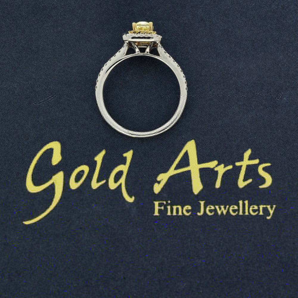 Platinum Yellow Radiant Cut Diamond & White Diamond Halo Shoulders Ring