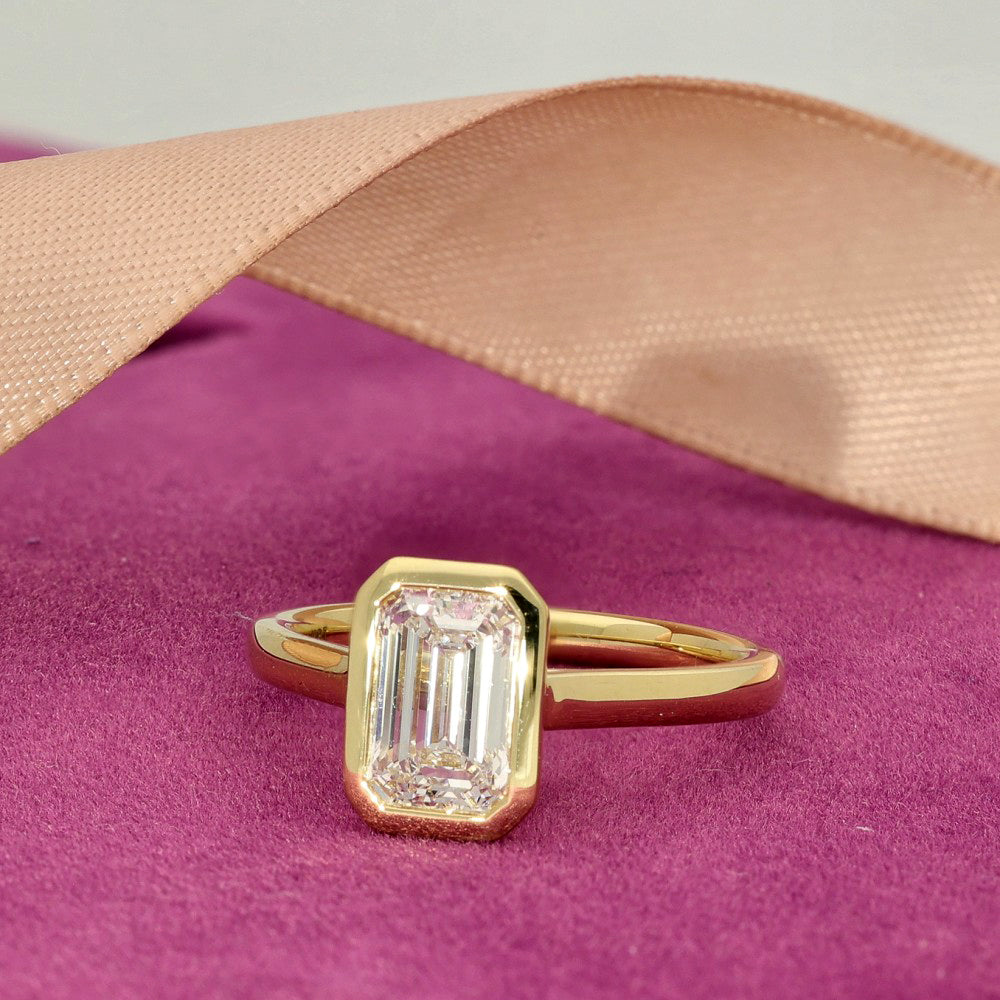 18ct Yellow Gold Laboratory-Grown 1.5ct Emerald Cut Diamond Bezel Set Solitaire Ring