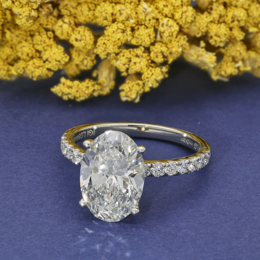 Platinum Laboratory-Grown Diamond 3ct Oval Solitaire with Hidden Halo & Shoulder Diamonds Ring