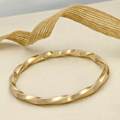 Pre-loved Solid 9ct Yellow Gold Twist Bangle 37.5g