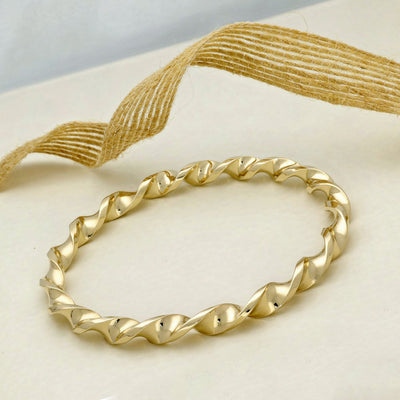 Pre-loved Solid 9ct Yellow Gold Twist Bangle 31g