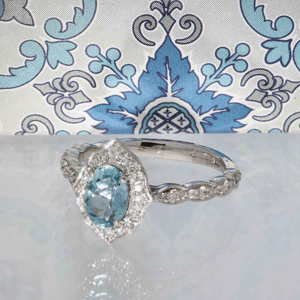 Platinum Aquamarine & Diamond Oval Halo Shoulders Ring