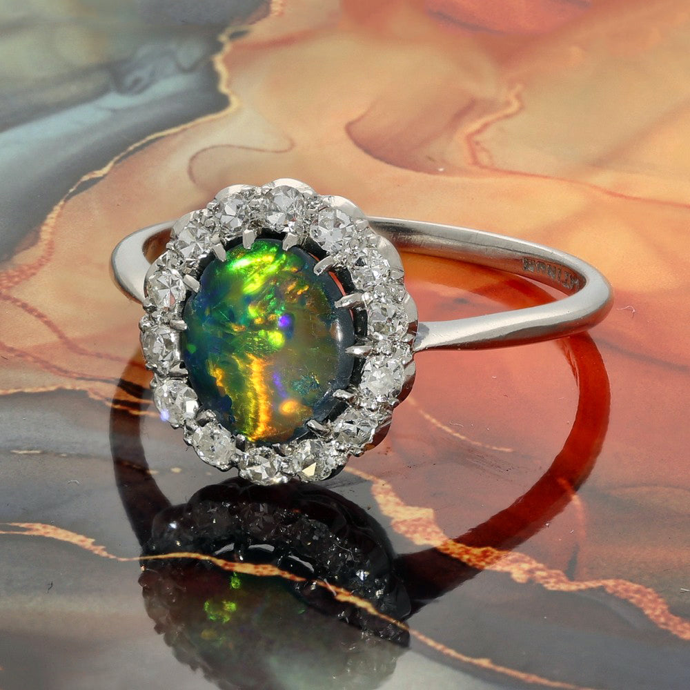 Vintage Platinum Black Opal and Diamond Halo Cluster Ring