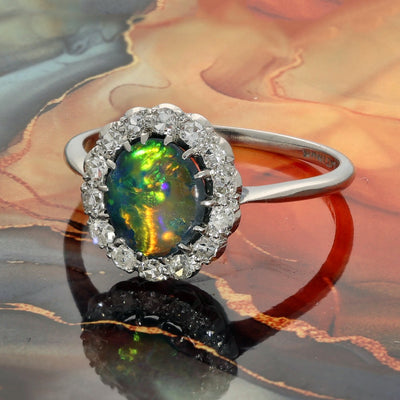 Vintage Platinum Black Opal and Diamond Halo Cluster Ring