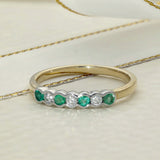 9ct Yellow and White Gold Rub-over Set Emerald and Diamond 7 Stone Ring