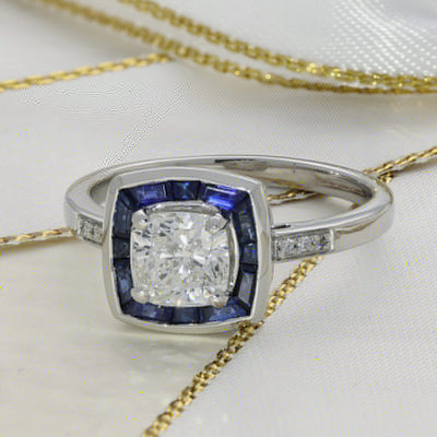 Pre-owned Platinum Certificated Diamond & Sapphire Halo Ring