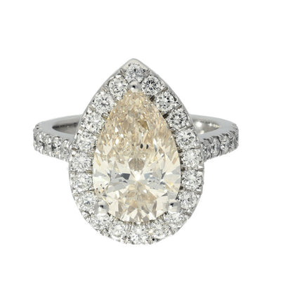 Pre-loved Platinum GIA Certificated 3ct Pear Cut Diamond Shoulders Halo Ring