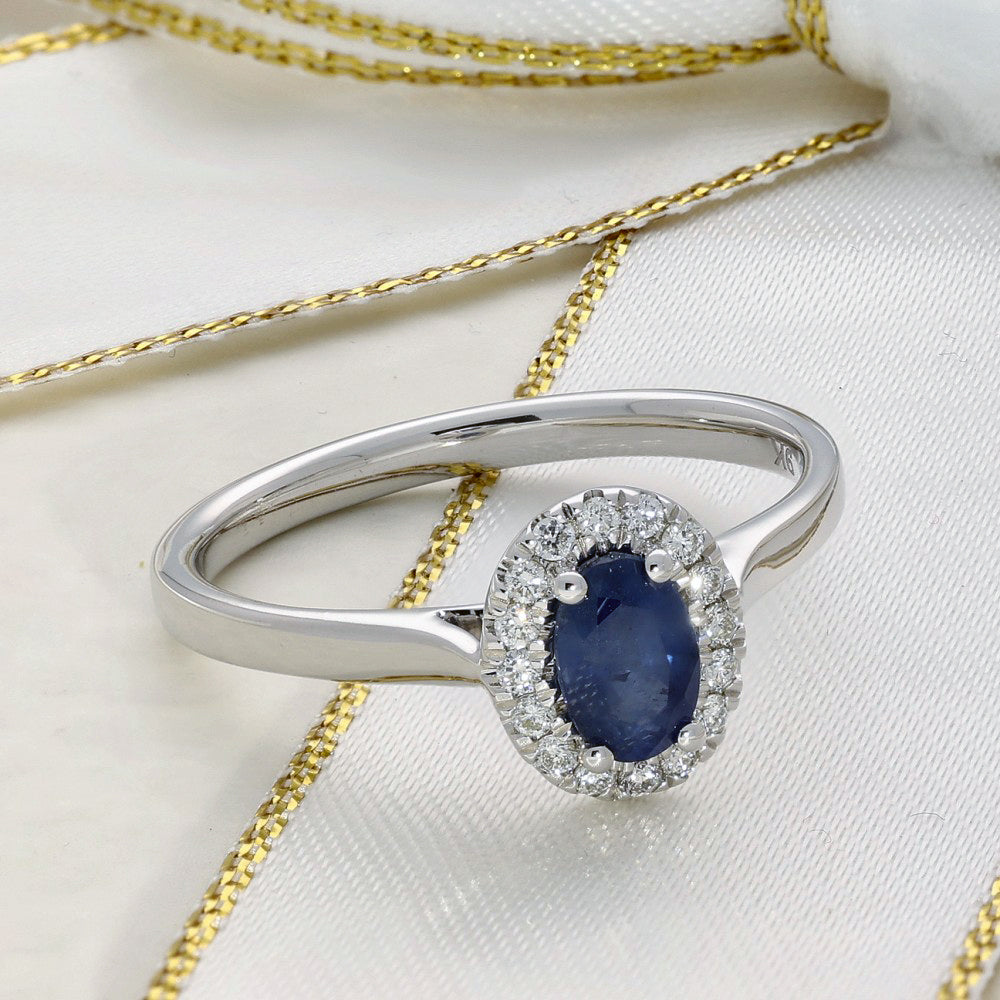 9ct White Gold Oval Sapphire and Diamond Halo Ring