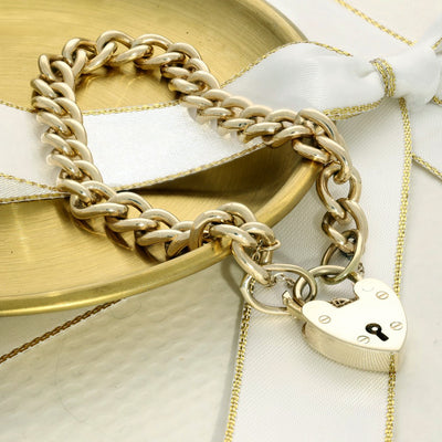Pre-loved 9ct Yellow Gold Curb Bracelet with Heart Padlock Clasp