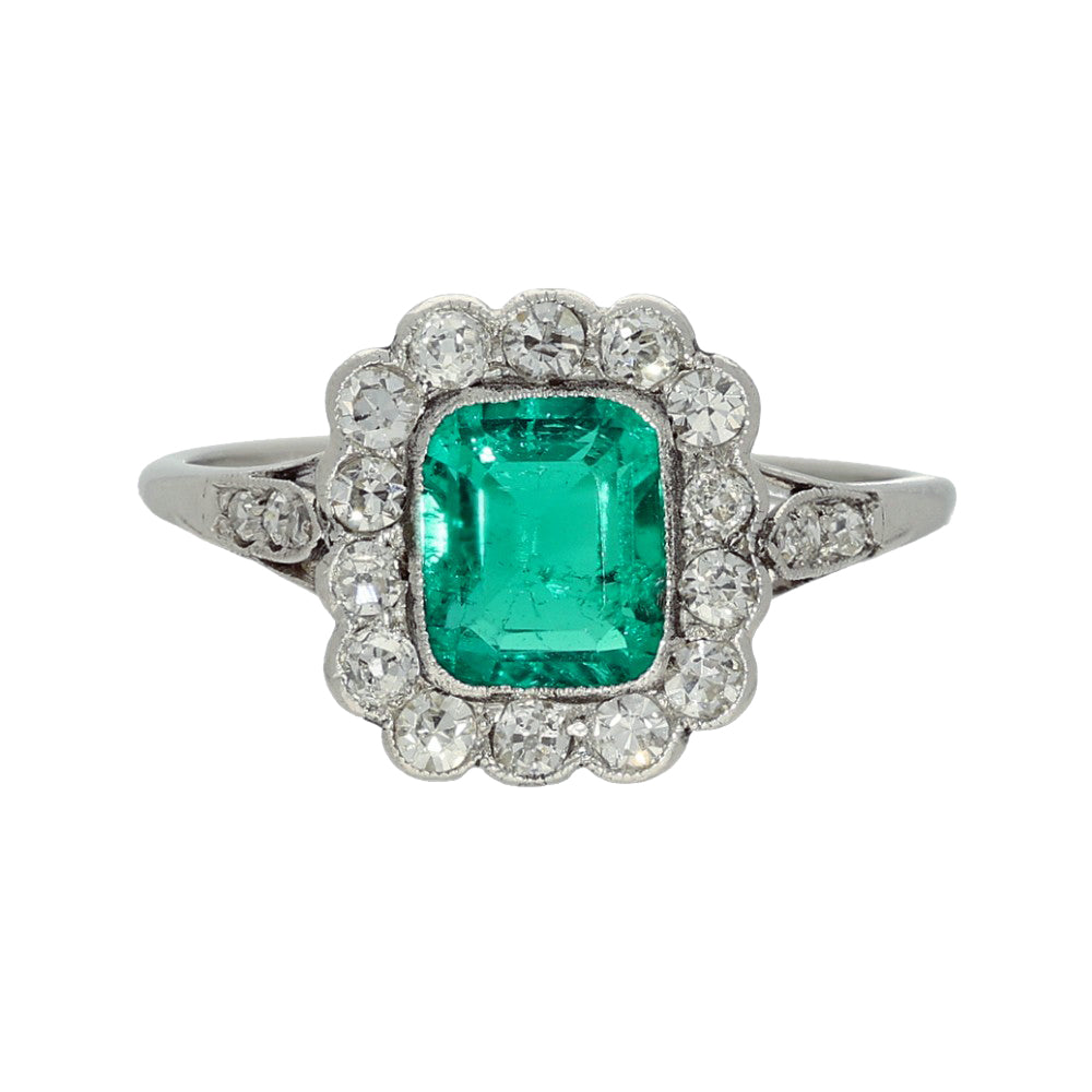 Vintage Platinum Emerald and Old Cut Diamond Halo Ring