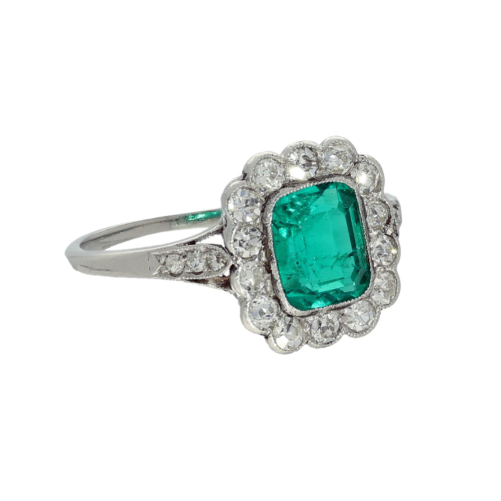Vintage Platinum Emerald and Old Cut Diamond Halo Ring