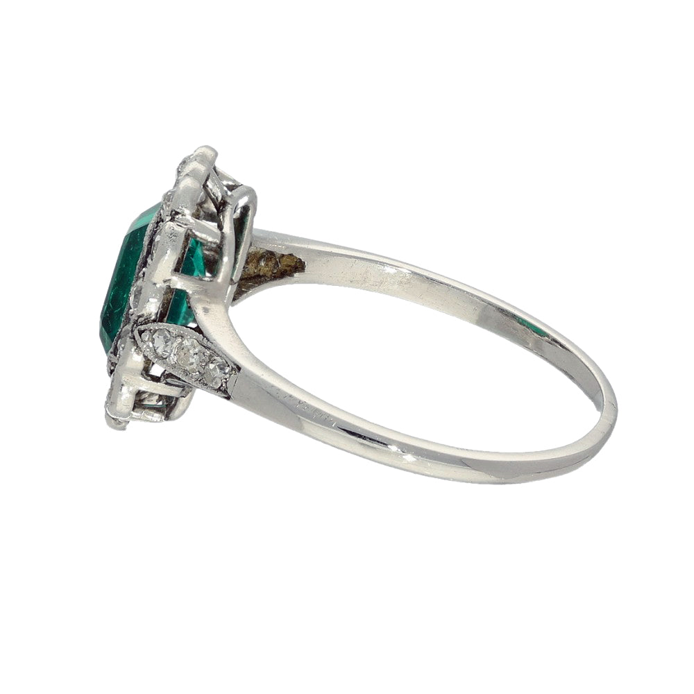 Vintage Platinum Emerald and Old Cut Diamond Halo Ring