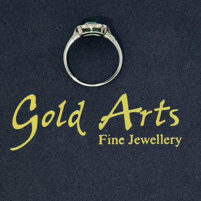 Vintage Platinum Emerald and Old Cut Diamond Halo Ring