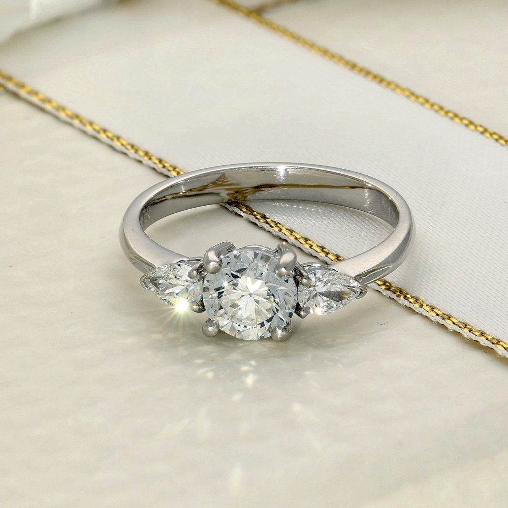 18ct White Gold Certificated 0.90ct Round Diamond with Pear Shape Diamonds Trilogy Ring