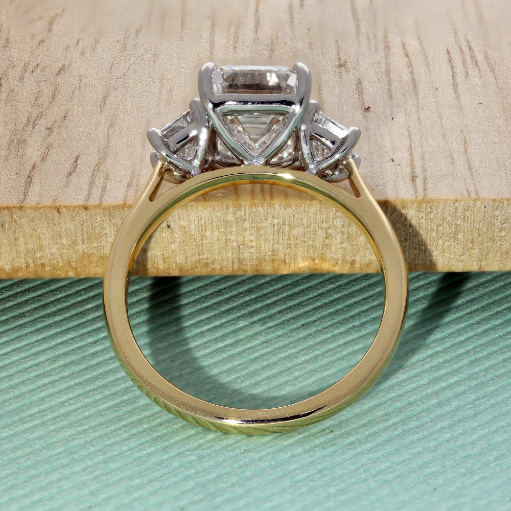 18ct Yellow Gold Laboratory-Grown Diamond 3ct Emerald with Trapezoid Cuts Trilogy Ring