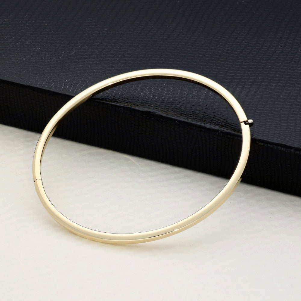 Pre-loved 9ct Yellow Gold Plain Slim Oval Bangle Bracelet