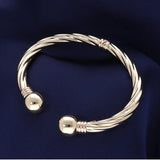 Preowned 9ct Gold Hollow, Hinged Torque Bangle with Twist Design