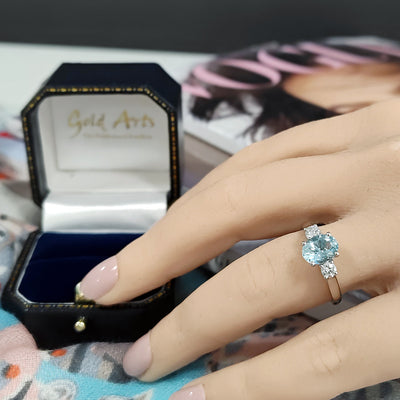 Platinum Oval Cut Aquamarine and Diamond Trilogy Ring