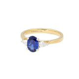 18ct Gold and Platinum, 1.07ct Oval-Cut Sapphire and .19pts Pear- Cut Diamond Trology Ring