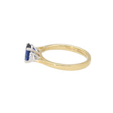 18ct Gold and Platinum, 1.07ct Oval-Cut Sapphire and .19pts Pear- Cut Diamond Trology Ring