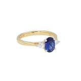 18ct Gold and Platinum, 1.07ct Oval-Cut Sapphire and .19pts Pear- Cut Diamond Trology Ring