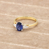 18ct Gold and Platinum, 1.07ct Oval-Cut Sapphire and .19pts Pear- Cut Diamond Trology Ring