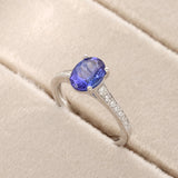 18ct White Gold 1.49ct Oval-cut Tanzanite with Tapered Diamond Soulders Ring