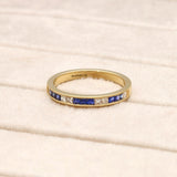 18ct Yellow Gold .28pts Square-cut Sapphire and .17pts Princess-cut Diamond Half Eternity Ring