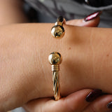 Preowned 9ct Gold Hollow, Hinged Torque Bangle with Twist Design