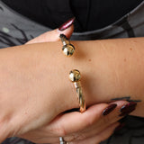Preowned 9ct Gold Hollow, Hinged Torque Bangle with Twist Design