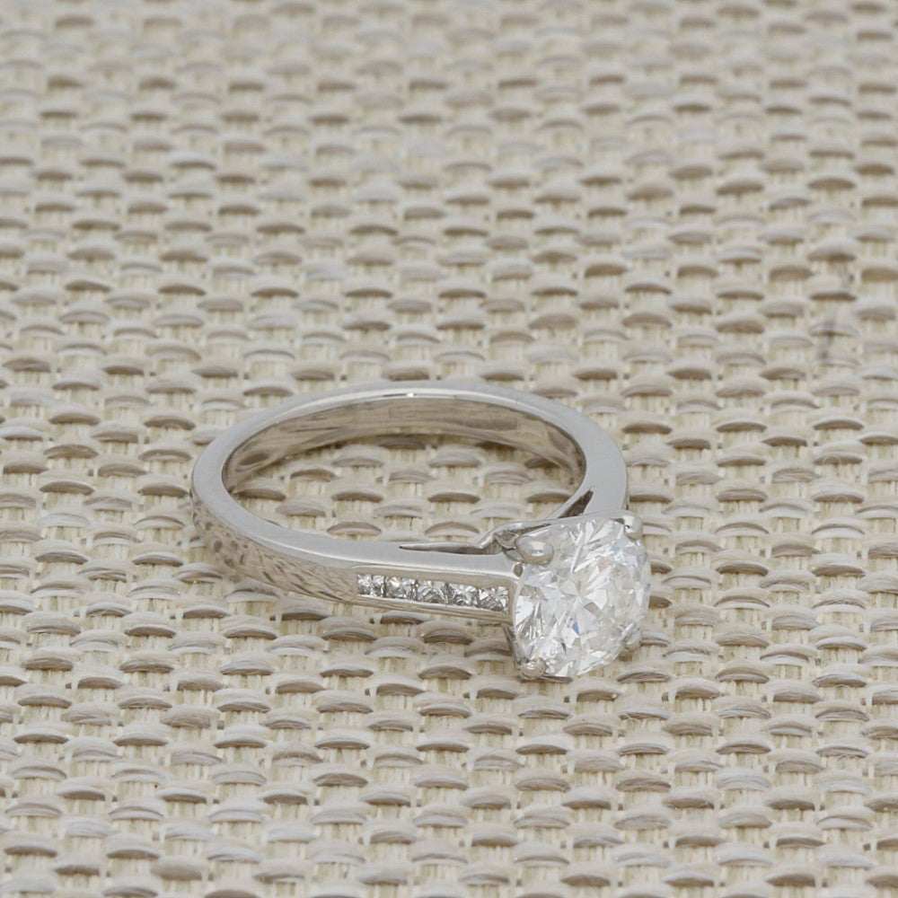 Platinum 1.50ct Round Diamond & Princess Cut Diamond Set Shoulders Ring