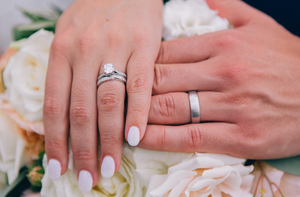 Bride and groom with wedding rings