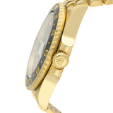 Close-up side view of a gold-tone wristwatch with a black rotating bezel and gold-tone metal bracelet on a white background.