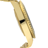 Close-up side profile of a gold-tone watch with a textured bezel and polished metal case on a white background.