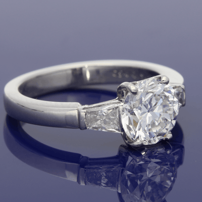 Platinum Solitaire Ring with Tapered Baguette Set Shoulders