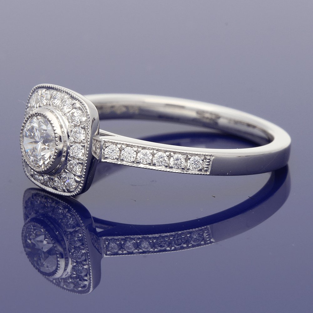 Platinum Diamond Halo Ring with Diamond Set Shoulders