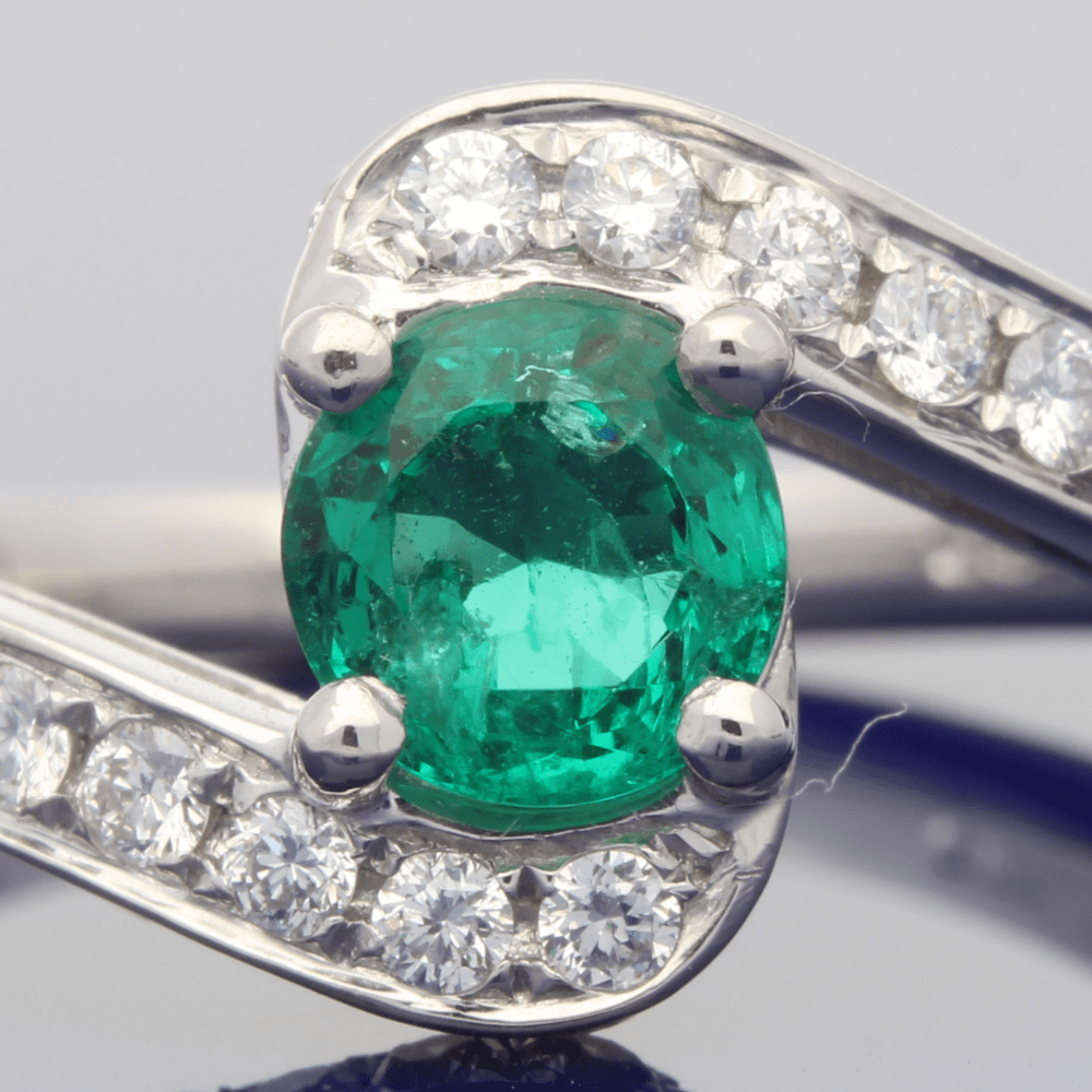 Platinum Emerald & Diamond Cross-Over Dress Ring