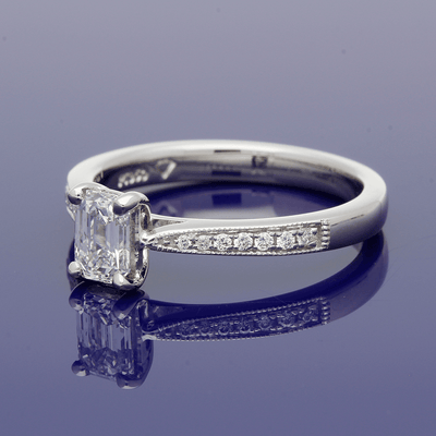 Platinum Certificated 0.53ct Emerald Cut Solitaire Ring with Diamond Shoulders