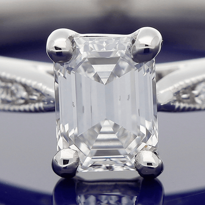 Platinum Certificated 0.53ct Emerald Cut Solitaire Ring with Diamond Shoulders