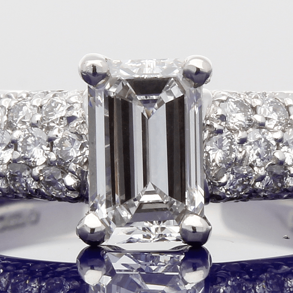 Platinum Certificated 0.78ct Emerald Cut Diamond with 0.57ct Pave Set Diamond Shoulders