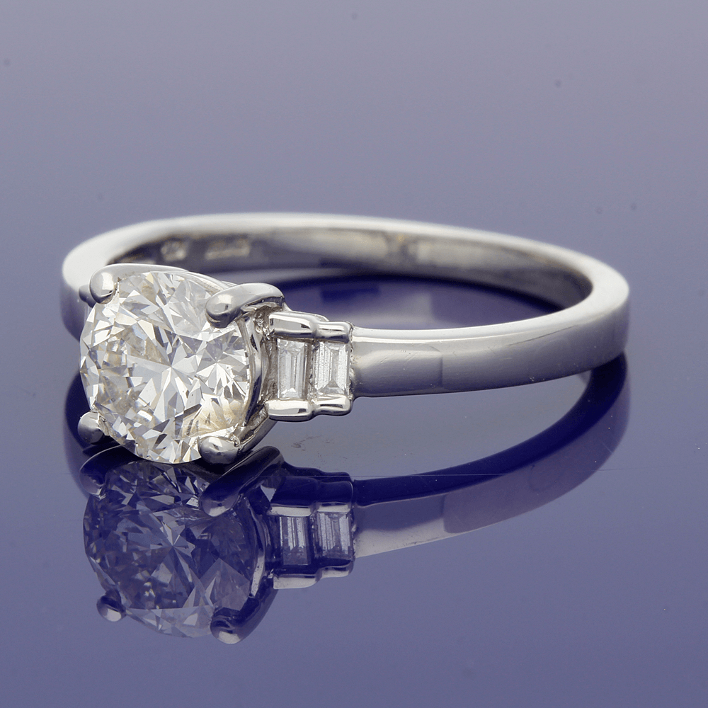 Platinum 0.93ct Round Brilliant Cut Diamond Solitaire Ring with Diamond Set Shoulders
