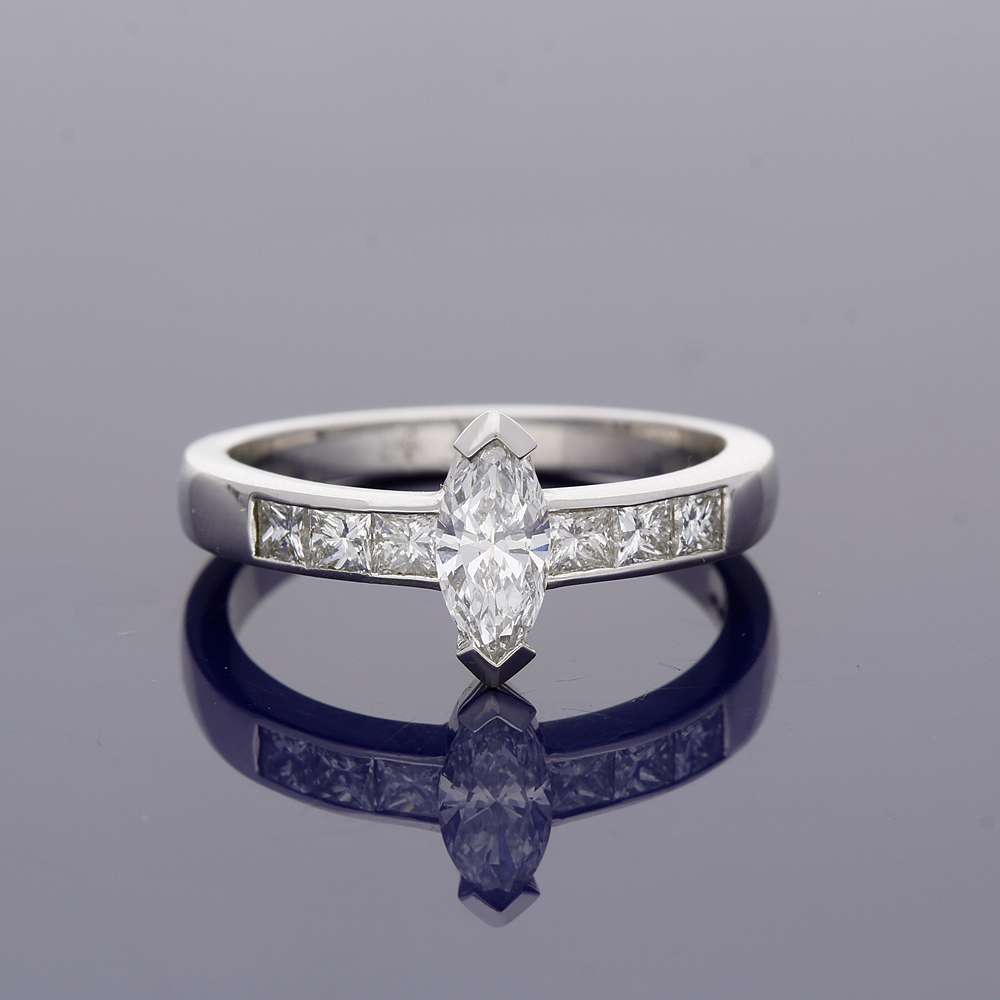Platinum 0.51ct Marquise Cut Diamond Solitaire Ring with Princess Cut Diamond Set Shoulders
