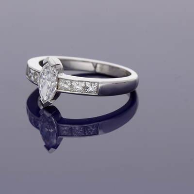 Platinum 0.51ct Marquise Cut Diamond Solitaire Ring with Princess Cut Diamond Set Shoulders