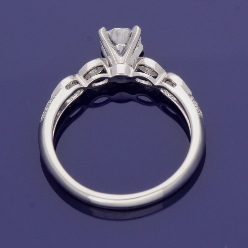 Platinum 0.56ct Solitaire with Diamond Set Shoulders Ring