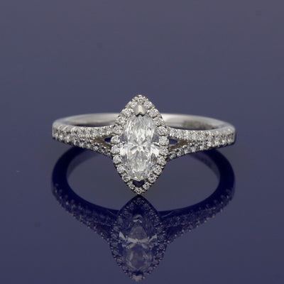Platinum Certificated Marquise Cut Diamond Halo Ring with Diamond Set Shoulders