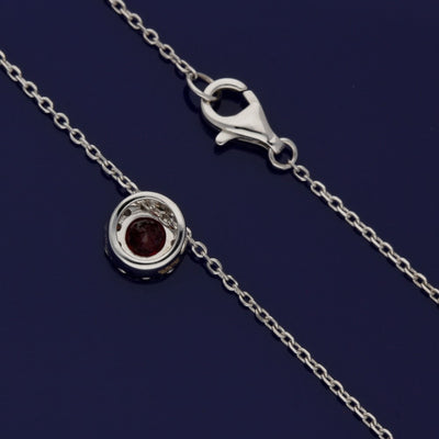 18ct White Gold Ruby and Diamond Halo Necklace