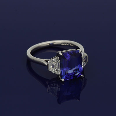 Platinum Trilogy Ring with 3.59ct Tanzanite and Trapezoid Diamond Shoulders