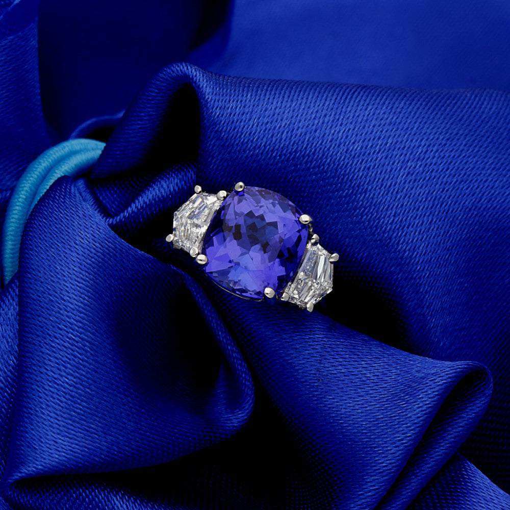 Platinum Trilogy Ring with 3.89ct Tanzanite and Cadillac Diamond Shoulders